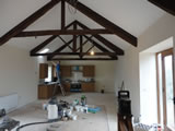 Conversion of a grade II listed barn into a private house